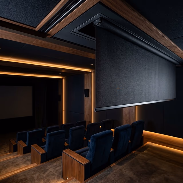 Bay Blinds motorized blackout shades with recessed shade pockets and sub-25 dBA operation in a luxury home theater, Marin County