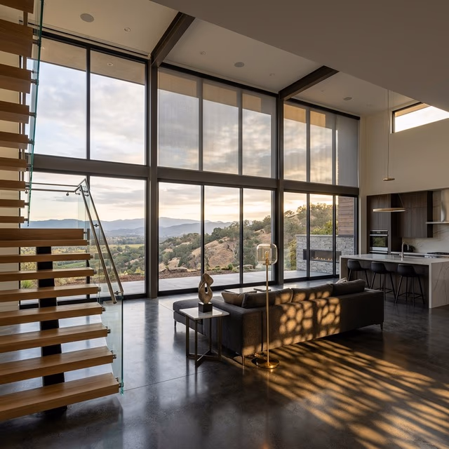 Bay Blinds Hunter Douglas motorized shades on floor-to-ceiling glass in a contemporary Marin County home