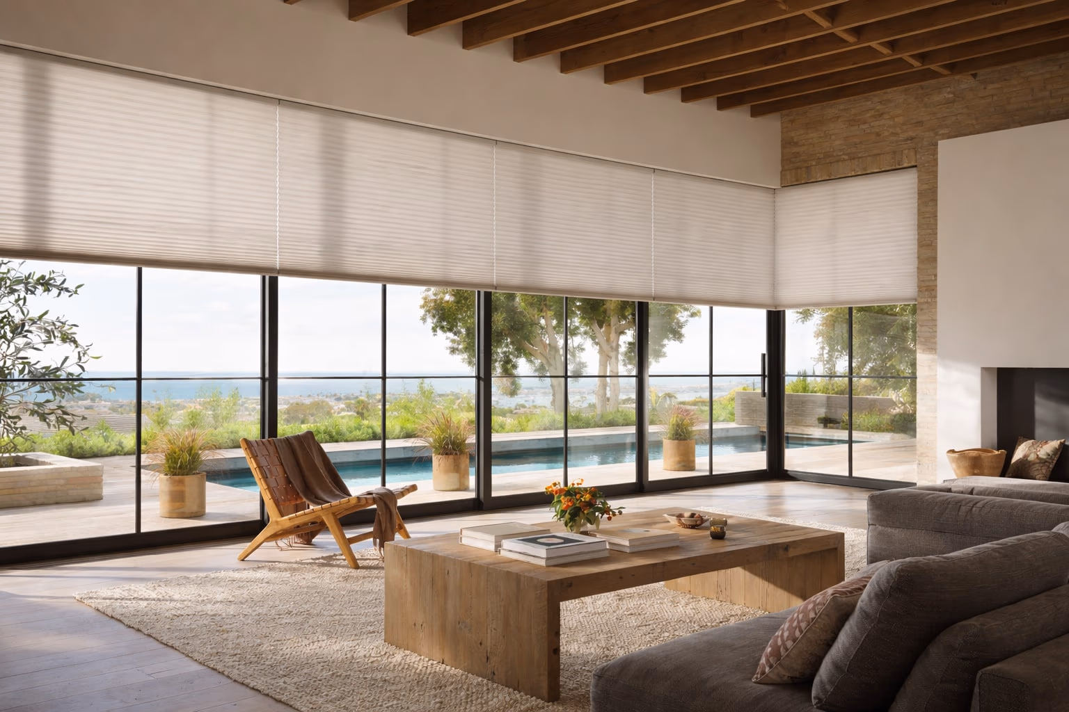 Bay Blinds Hunter Douglas Duette honeycomb cellular shades with R-7.0 insulation in a modern open-plan living room representing East Petaluma and the McDowell Boulevard corridor, Petaluma CA 94954