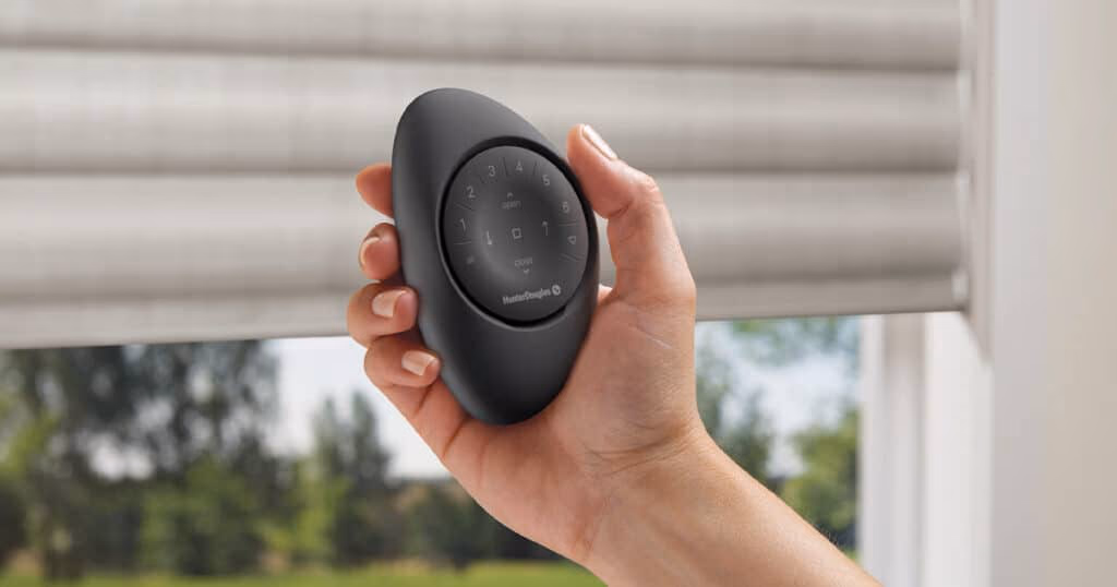 Hunter Douglas PowerView Pebble Remote controlling motorized shades, installed by Bay Blinds in Marin County