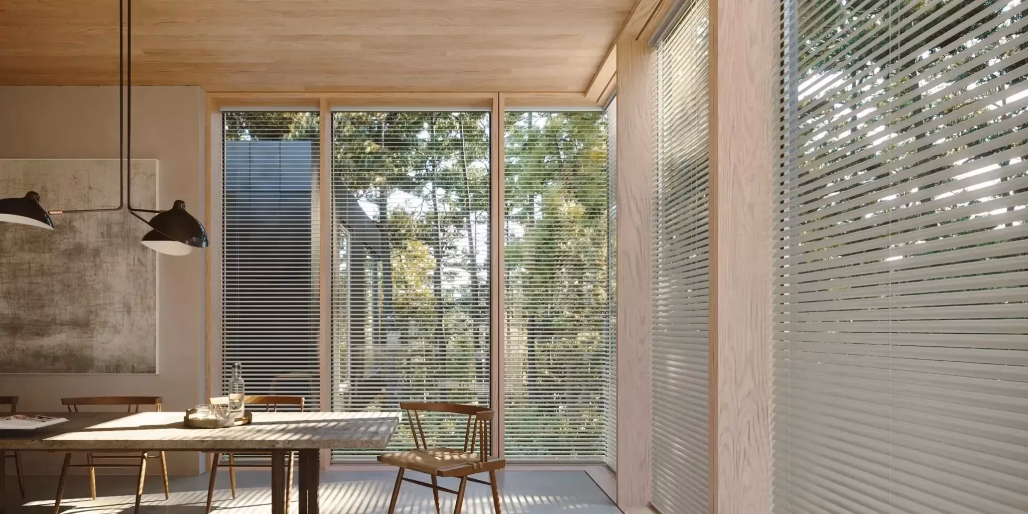 Bay Blinds custom Scandinavian-inspired wood blinds with basswood slats and Ultraglide retractable cord system in a Marin County dining room, Novato CA 94945