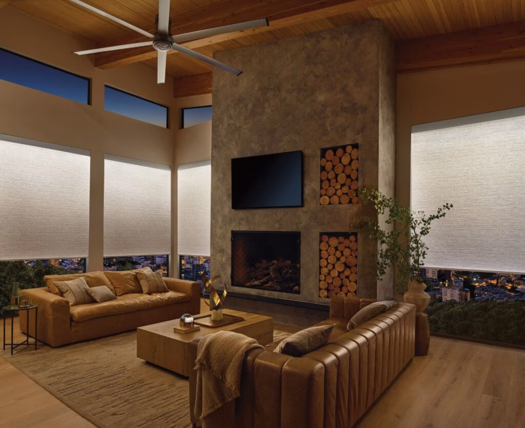Hunter Douglas Aura illuminated shades casting a warm even glow through the fabric in a modern Marin County living room, installed by Bay Blinds Novato CA 94945