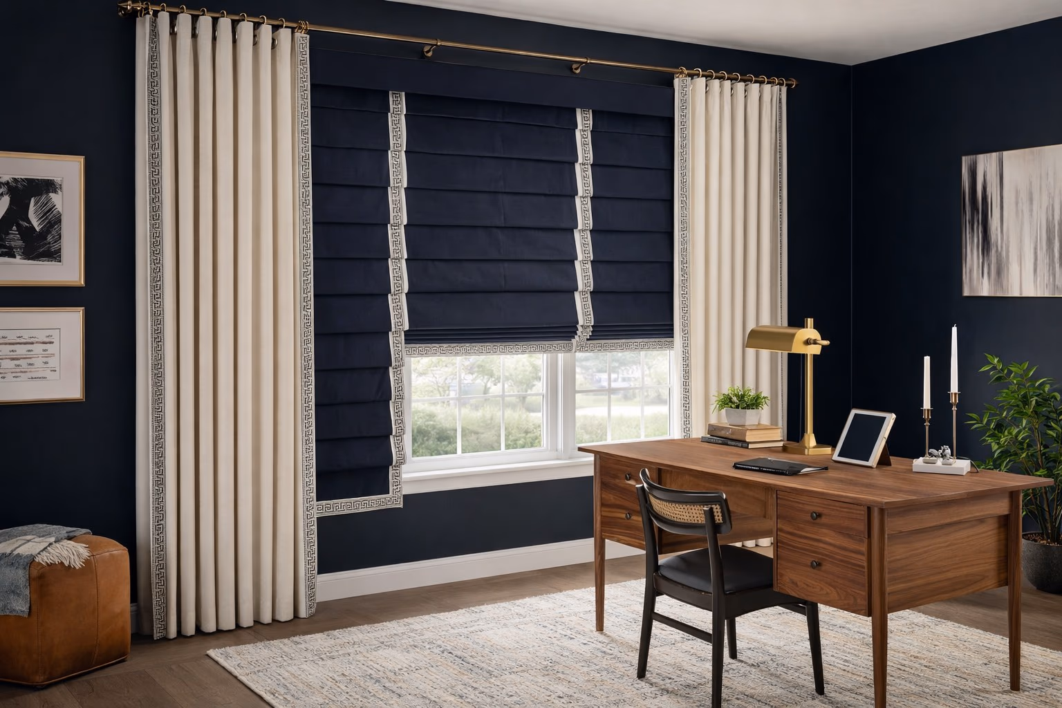 Hunter Douglas Design Studio Roman Shades paired with custom drapery panels with Greek key trim in a sophisticated navy blue home office, installed by Bay Blinds