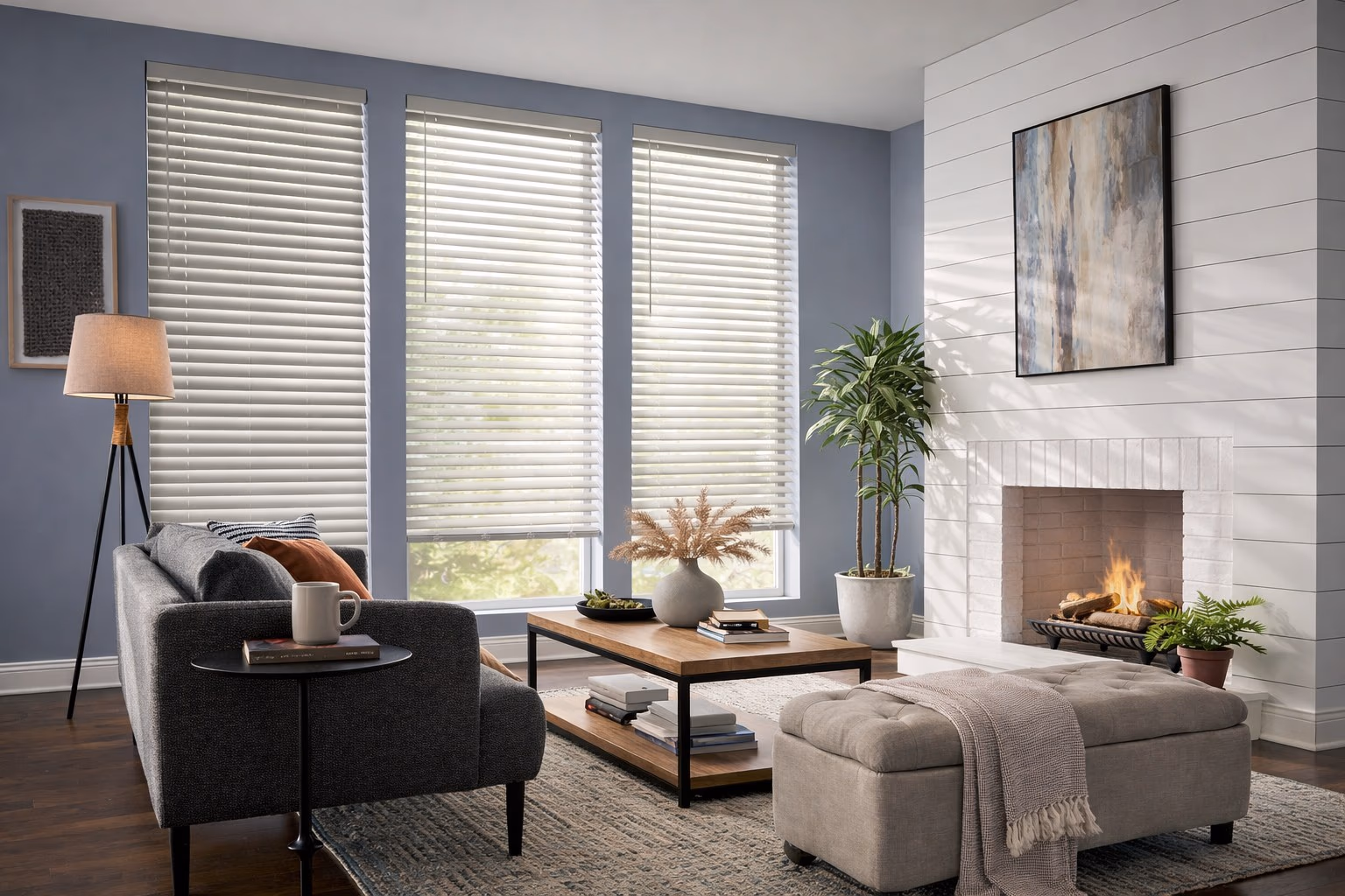 Hunter Douglas EverWood alternative wood blinds on three windows in a modern living room, installed by Bay Blinds, Novato CA 94945