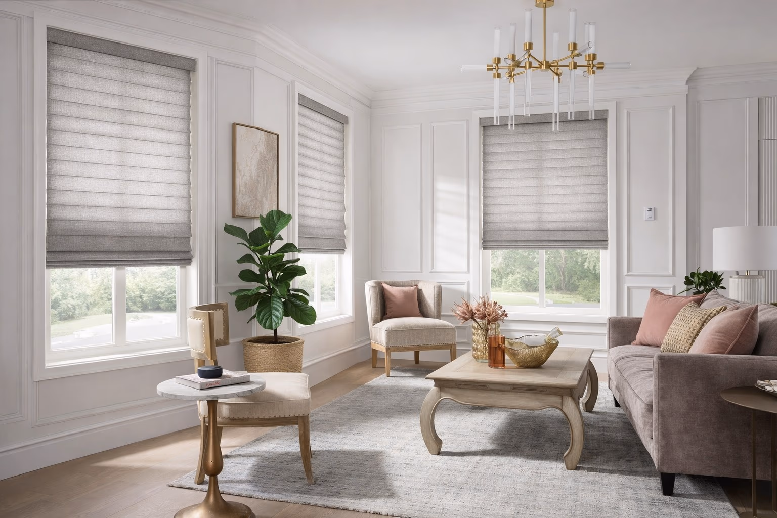 Hunter Douglas Vignette Roman Shades with tailored fabric folds in a formal living room with crystal chandelier white wainscoting and pink accent pillows, installed by Bay Blinds