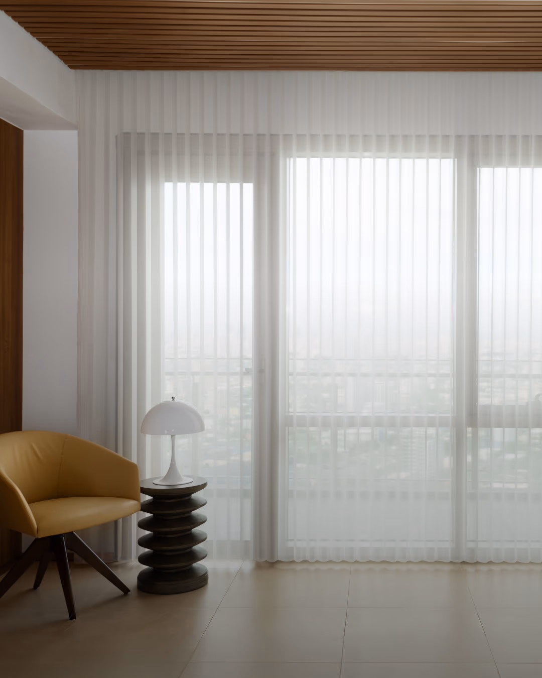 Wide-width sheer panels spanning floor-to-ceiling windows with no vertical seams, installed by Bay Blinds, Novato CA 94945